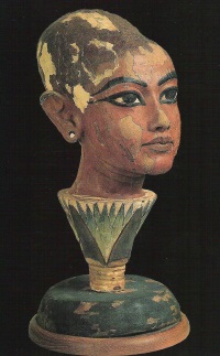 Head of young King Tutankhamun emerging from a lotus flower (Cairo Museum)